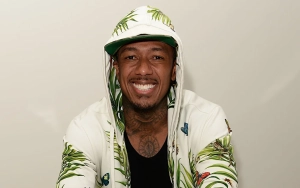Nick Cannon Transforms Into Giant Bunny for Easter Sunday With His Big Brood
