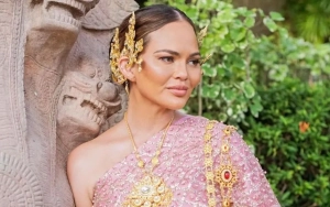 Chrissy Teigen Slams Troll Accusing Her of Having Kids to 'Stay Relevant'