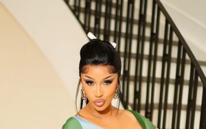 Cardi B Slammed for 'Showing Off Like' Adult Film Star After Posing in Steamy Schoolgirl Outfit