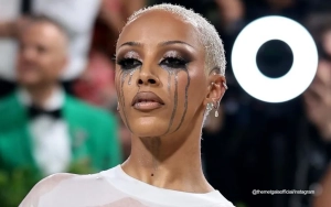 Doja Cat Gets Deep With Her Wet Dress for 2024 Met Gala