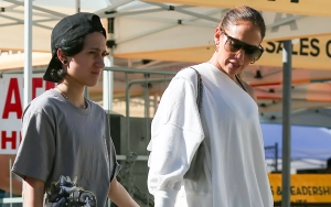 Jennifer Lopez's Child Emme Flaunts Flesh Tunnels on Paris Day Out With Singer