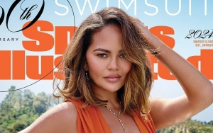 Chrissy Teigen Makes Jaws Drop in New Sports Illustrated Swimsuit Issue Cover