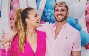 Logan Paul Cradles Nina Agdal's Baby Bump at SI Swimsuit Launch Party