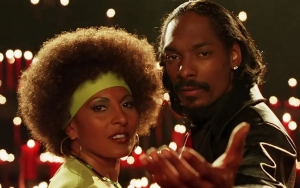 Pam Grier Unveils Snoop Dogg's Exceptional Kissing Skills
