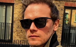 Sam Heughan Walks Hand-in-Hand With Mystery Woman During London Outing