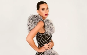Katy Perry Spreads Legs on Balcony at Antibes Hotel in New Photo