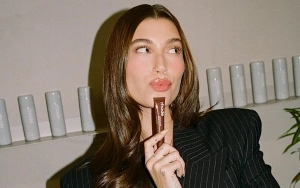 Hailey Bieber Flaunts Growing Baby Bump During Sushi Outing