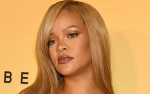 Rihanna Praised for Her Reaction After Almost Snatching Fan's Wig at Paris Fashion Week