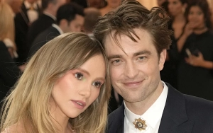 New Parents Suki Waterhouse and Robert Pattinson Take Baby Daughter on a Stroll