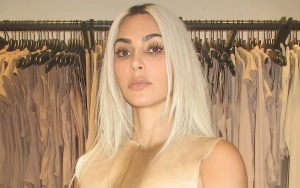 Kim Kardashian Flashes Her Famous Backside in Glamorous Photo Shoot
