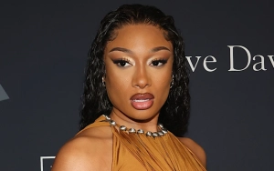 Megan Thee Stallion Shows Off a Huge Live Snake to Her Friends at Album Release Party