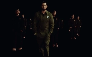 Eminem Takes Fans to Slaughter House in 'Tobey' Music Video