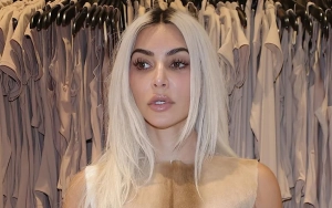 Kim Kardashian Surfs for the 'First Time Ever' With Help From Pro Instructor
