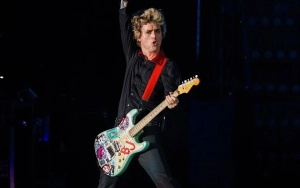 Green Day's Billie Joe Armstrong Under Fire for Brandishing 'Idiot' Trump Mask at Concert
