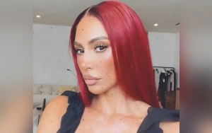 Kim Kardashian Embraces Upcoming Fall Season With Fiery Red Hair