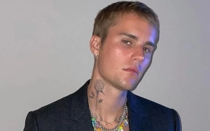 Justin Bieber Hides His Face Behind Mask in First Outing Since Becoming First-Time Dad