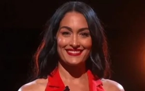 Nikki Garcia All Smiles as She Hosts Hotdog Eating Contest After Husband Artem Chigvintsev's Arrest