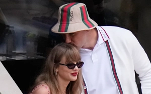 Taylor Swift Poses With 'Eras Tour' Poster at Travis Kelce's NFL Game