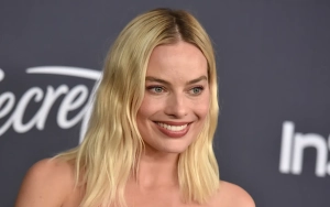 Margot Robbie Showcases Baby Bump During Cozy L.A. Outing