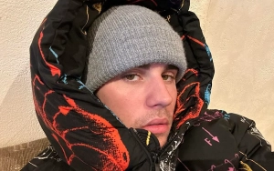 Justin Bieber Holds Papa Bear Mug During Church Outing