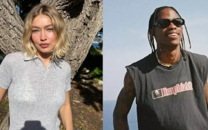 Gigi Hadid Rocks Duct Tape Dress, Holds Hands With Travis Scott at Paris Fashion Week
