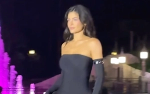 Kylie Jenner Enchanting at Disneyland Paris in Black Ball Gown for Coperni Show