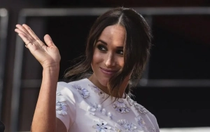 Meghan Markle Steps Out Solo at Children's Hospital L.A. Gala, Dazzles in Red Plunging Gown