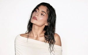 Kylie Jenner Puzzles Fans With New Video Promoting White Coat