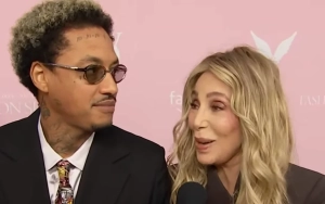 Cher and Boyfriend Alexander 'AE' Edwards Get Cozy at Victoria's Secret Fashion Show