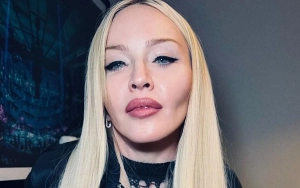 Madonna Ditches Top as She Enjoys Meal in New Photos