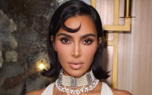 Kim Kardashian Wears Princess Diana's Attallah Cross on Red Carpet at LACMA Gala