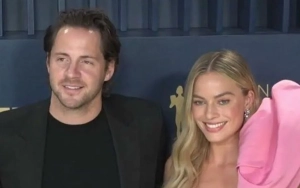 Margot Robbie Steps Out for First Time Since Giving Birth, Joins Husband and Newborn Baby in Stroller