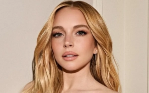 Lindsay Lohan Puts on Busty Display as She Steps Out in New York City