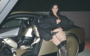 Kim Kardashian Unbothered by Trolls in New Intimate Photos With Tesla Robot 'Boyfriend'