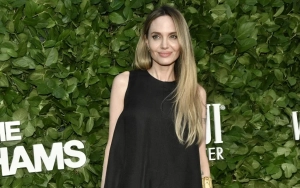 Angelina Jolie Flaunts New Tattoo on Her Arm at Gotham Awards