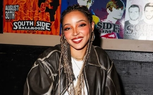 Tinashe Paddleboarding in Sizzling Outfit During Tropical Getaway