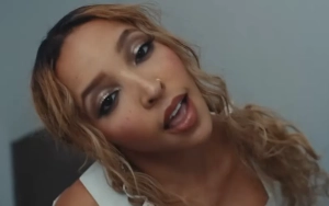 Tinashe Gets Dragged Into Cell in New 'Cross That Line' Music Video