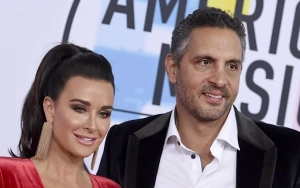 Mauricio Umansky Makes Out With Mystery Brunette in Front of Kyle Richards' Close Friends