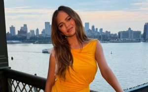 Chrissy Teigen Got Hit in the Face During Painful Fashion Mishap
