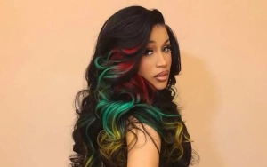 Cardi B Cuddling Baby Daughter in Heartwarming Rare Photo