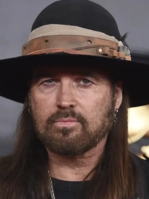 Billy Ray Cyrus and Elizabeth Hurley Debut Romance With Easter Kiss