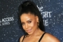 Pics: Sanaa Lathan Shines in Gold at 'Twilight Zone' Premiere
