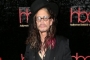Watch: Steven Tyler Carries on Singing Despite Onstage Fall Mid-Aerosmith Concert