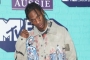Travis Scott Shuts Down Instagram After Clowned Over His Batman Costume