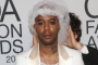 Kid Cudi Turns Heads as He Arrives in White Wedding Dress and Black Jesus Piece at 2021 CFDA