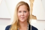 Amy Schumer Slammed for Not Commenting on NY Shooting After Saying She's Traumatized by Oscars Slap