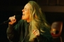 Adele Holds Back Tears at First Concert in Five Years
