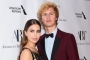 Ansel Elgort Locks Lips With Bikini-Clad Woman Amid Rumors He Splits From Longtime GF 