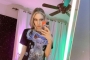 Fans Convinced Grimes Gets 'Elf Ear' Surgery After She Shares Pic of Bandaged Face