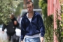 Justin Bieber Snaps at Paparazzi in New Video: 'Losers'